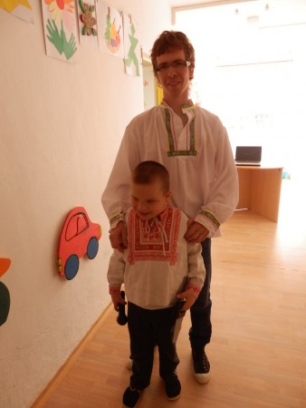 Teacher and a child from our school in traditional costume